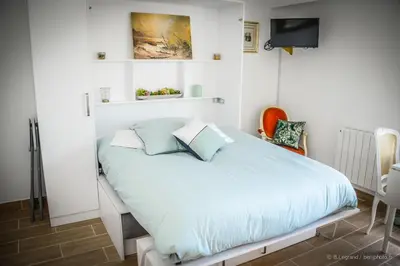 Un ou plusieurs lits dans un hébergement de l'établissement STUDIO COSY