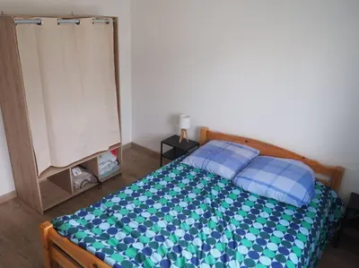 Un ou plusieurs lits dans un hébergement de l'établissement Maison 6-8 personnes 3 chambres
