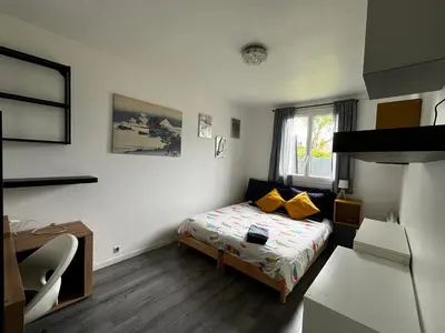 Un ou plusieurs lits dans un hébergement de l'établissement Maison HERMANVILLE SUR MER plein pied-à côté de la plage