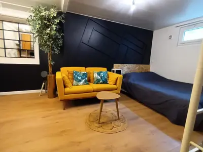 Coin salon dans l'établissement Studio cosy 2 à 4 pers parking privé