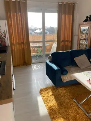 Coin salon dans l'établissement Appartement calme et ensoleillé