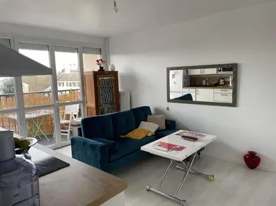 Coin salon dans l'établissement Appartement calme et ensoleillé
