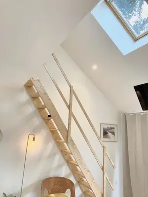 Télévision ou salle de divertissement dans l'établissement Cocon Maritime 1 chambre & 1 Mezzanine