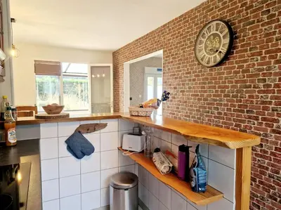Cuisine ou kitchenette dans l'établissement Les Capucines