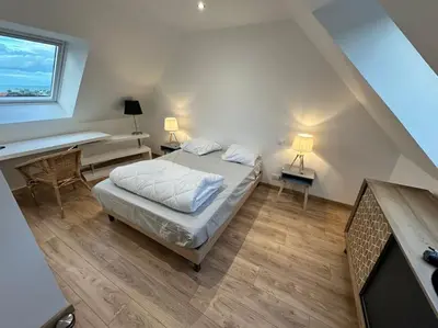 Un ou plusieurs lits dans un hébergement de l'établissement Maison vue mer chez Aline