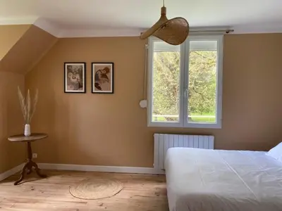 Un ou plusieurs lits dans un hébergement de l'établissement AU DOMAINE DU MESNIL