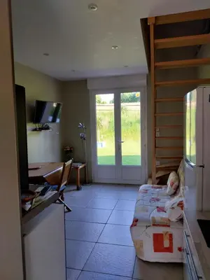 Télévision ou salle de divertissement dans l'établissement Gite Du Palefrenier