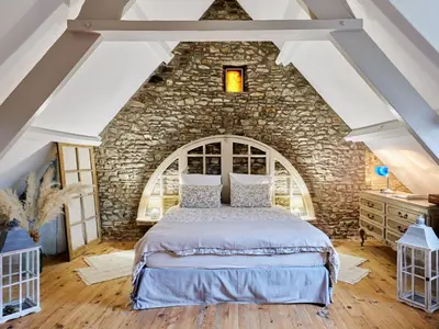 Un ou plusieurs lits dans un hébergement de l'établissement Holiday Home La Glycine by Interhome