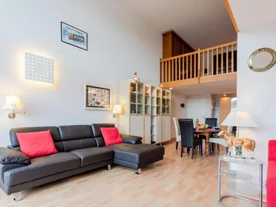 Coin salon dans l'établissement Apartment Les Lofts-17 by Interhome