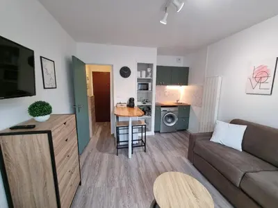 Coin salon dans l'établissement Echappée en bord de mer - studio à la plage !