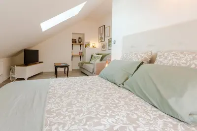 Un ou plusieurs lits dans un hébergement de l'établissement Gîte Avec Jacuzzi Chic & Cosy entre Caen et la Mer en Normandie