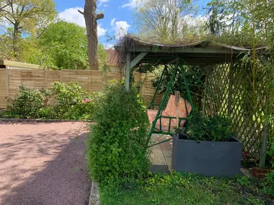 Jardin de l'établissement GITE Au Dessus des Pâquerettes