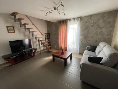 Télévision ou salle de divertissement dans l'établissement CAMILLE à VER SUR MER