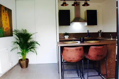 Télévision ou salle de divertissement dans l'établissement Le petit gîte de Cancale, Saint-Malo, Bretagne