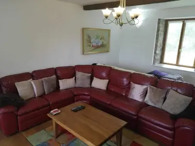 Coin salon dans l'établissement NormanD Holiday Home - VIRE CALVADOS Relaxing Rural Retreat