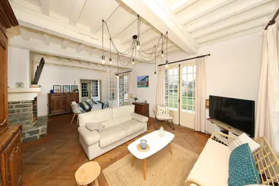 Coin salon dans l'établissement La Belle Etoile - Maison avec grand jardin