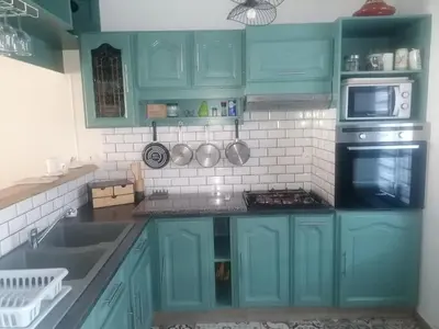 Cuisine ou kitchenette dans l'établissement La Planche