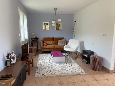 Coin salon dans l'établissement L'Océan, maison avec jardin clos