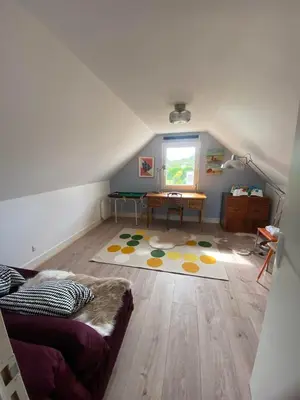 Coin salon dans l'établissement L'Océan, maison avec jardin clos