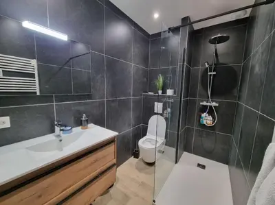 Salle de bains dans l'établissement La Tanière de la baie - Maison 6-8 pers