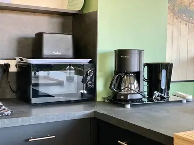 Cuisine ou kitchenette dans l'établissement L'Atelier Saint-Martin by Melrose