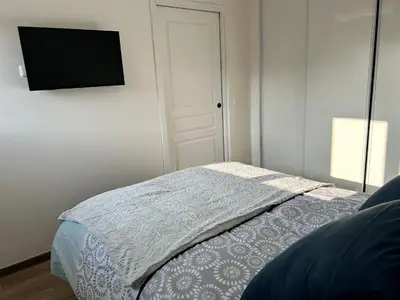 Un ou plusieurs lits dans un hébergement de l'établissement Maison au calme, à la campagne