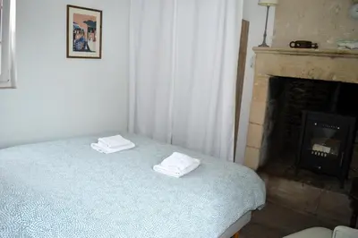 Un ou plusieurs lits dans un hébergement de l'établissement Petite vague - maison atypique avec terrasse