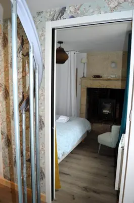 Un ou plusieurs lits dans un hébergement de l'établissement Petite vague - maison atypique avec terrasse