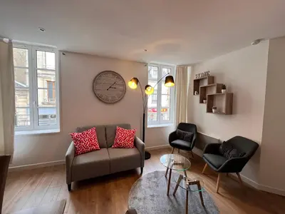 Coin salon dans l'établissement L'Elégant Bayeusain - Appartement 4P Centre Bayeux