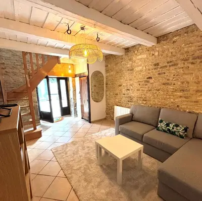 Coin salon dans l'établissement Villa des Malons - Maison à 100m de la plage