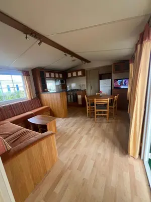 Télévision ou salle de divertissement dans l'établissement Mobile-home Camping 4 etoiles bord de mer