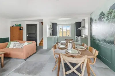 Un ou plusieurs lits dans un hébergement de l'établissement La Baie - Belle maison de charme -Jardin et Parking