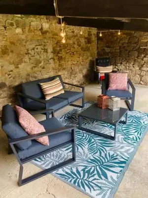 Coin salon dans l'établissement La Baie - Belle maison de charme -Jardin et Parking
