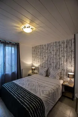 Un ou plusieurs lits dans un hébergement de l'établissement Au Gîte d'Isigny - Maison de vacances - Normandie