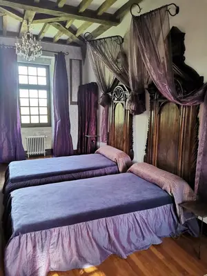 Un ou plusieurs lits dans un hébergement de l'établissement Chateau de Courseulles