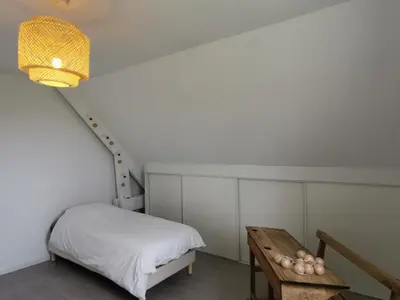 Un ou plusieurs lits dans un hébergement de l'établissement La maison des Alliés Bayeux