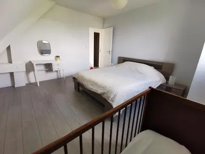 Un ou plusieurs lits dans un hébergement de l'établissement La maison des Alliés Bayeux