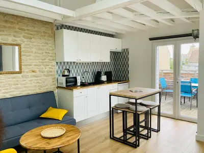 Cuisine ou kitchenette dans l'établissement Joli F2 avec terrasse 150m plage