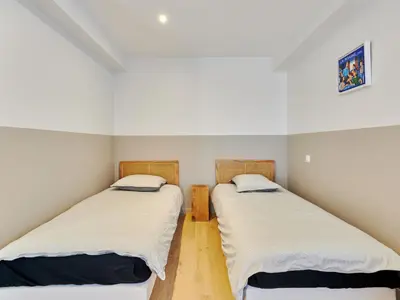 Un ou plusieurs lits dans un hébergement de l'établissement Holiday Home Le Sund by Interhome