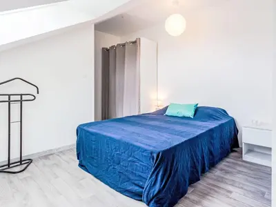 Un ou plusieurs lits dans un hébergement de l'établissement Apartment Les Maisons de la Mer-6 by Interhome