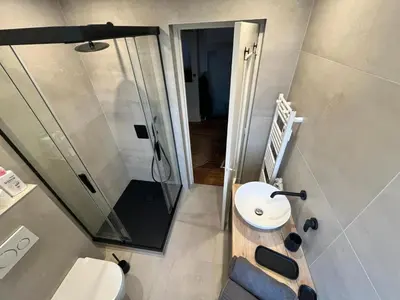 Salle de bains dans l'établissement Le Grenier de Maltot