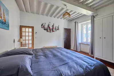 Un ou plusieurs lits dans un hébergement de l'établissement Augustine Beach - Maison à 700 m de la plage