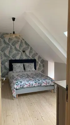 Un ou plusieurs lits dans un hébergement de l'établissement Aux Portes de la Hougue