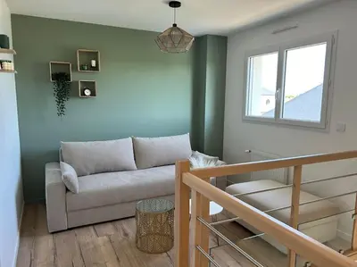 Coin salon dans l'établissement Gîte des couleurs