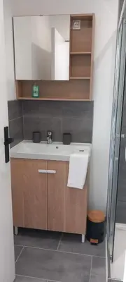 Cuisine ou kitchenette dans l'établissement La maisonnette cherbourgeoise