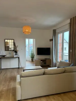 Télévision ou salle de divertissement dans l'établissement Appartement Cote des Isles