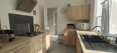Cuisine ou kitchenette dans l'établissement Villa des roses, comme à la maison