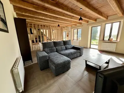 Coin salon dans l'établissement Gîte de la Tessonnière