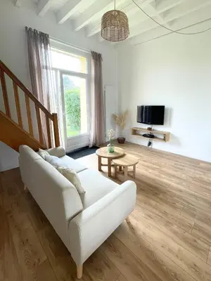 Télévision ou salle de divertissement dans l'établissement Gîte la Coquille - Chaleureux & paisible