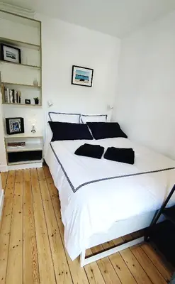 Un ou plusieurs lits dans un hébergement de l'établissement Appartement 1 Maison Dior, centre, plage à 500 m